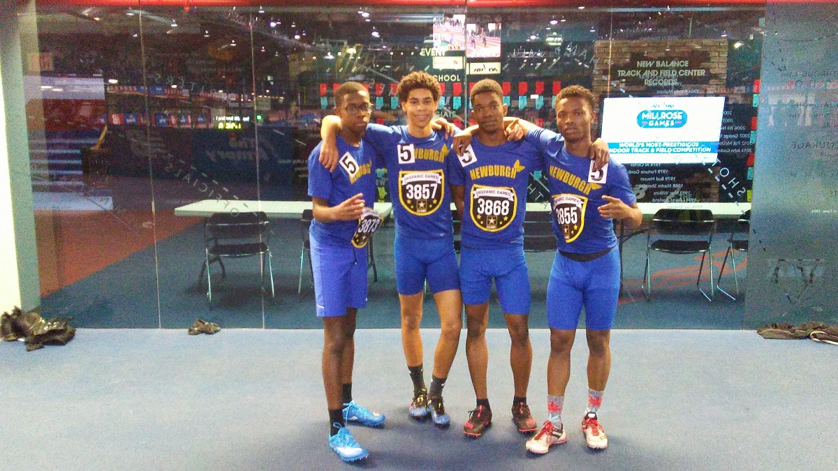 Members of the Boys Track team pose for a photo