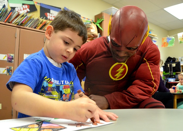 The Flash watching a student color