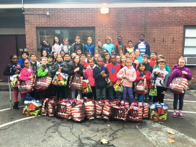 Students Deliver their first donation.