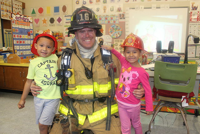 Student with a firefighter