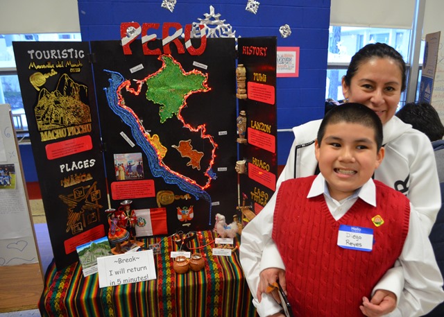 A parent and student with their Peru project.