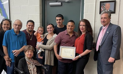 Hector Almodovar with his wife Arlene and family.