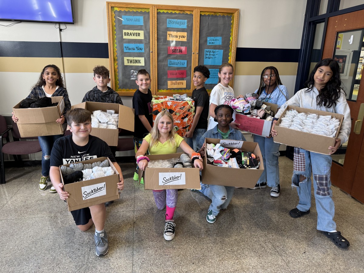 Thumbnail for Heritage Middle School Collects 1,171 Pairs of Socks for SOCKtober!